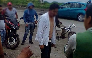 #Toluca: dan golpiza a chofer que intentó robar tienda de aceites