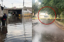 Vehículo varado por inundación tras las fuertes lluvias