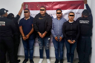 Se aseguraron tres vehículos, armas de fuego y dinero en efectivo. 