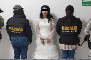Novia detenida por fuerzas de seguridad momentos antes de su boda.