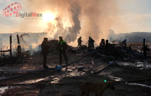 Mueren dos durante incendio en tiradero de basura en Neza