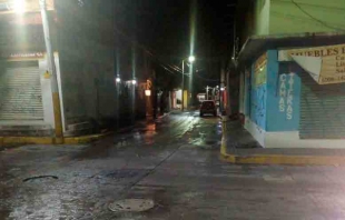 Cae barda de primaria en Tultepec por aguacero de este domingo