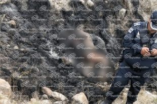 Cuerpo calcinado de un joven fue localizado en un camino de terracería en Almoloya de Juárez.