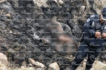 Cuerpo calcinado de un joven fue localizado en un camino de terracería en Almoloya de Juárez.