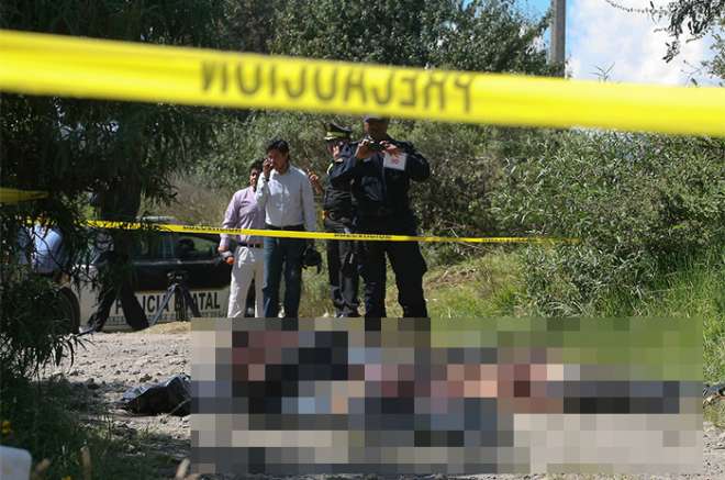 Los cuerpos fueron arrojados en plena vía pública