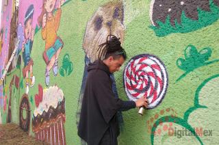 Durante poco más de un mes quince personas se involucraron en la realización del mural de 840 metros cuadrados