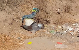 Hallan cadáver amordazado y atado en Chicoloapan