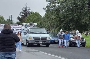 Manifestantes sobre Avenida Paseo Tollocan