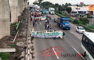 Ejidatarios de San Mateo Atenco marchan en protesta a la Ciudad de México