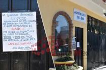 Un letrero en el portón negro del lugar, alerta a los vecinos sobre las condiciones sanitarias que privan en el albergue