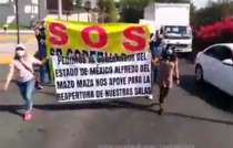 El grupo de unas 50 personas se concentró desde la plaza comercial de Mundo E y avanzó por la lateral de Periférico