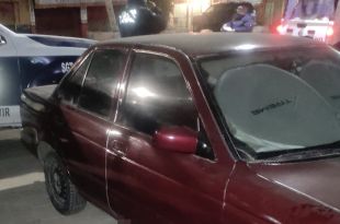 La víctima quedó tendida entre los vehículos del estacionamiento de la Base de Operaciones de Guadalquivir de la policía de Ecatepec.