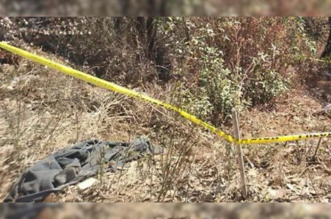 Autoridades acordonaron el área donde fue hallado el cuerpo