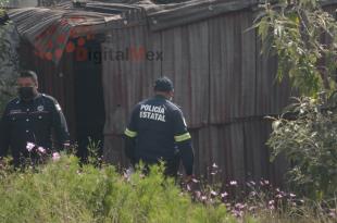 El cuerpo era de una joven de entre 15 y 17 años que vestía playera blanca y pantalón de mezclilla azul.