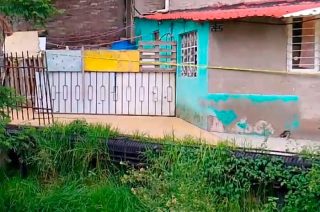 Vivienda donde un niño de cinco años perdió la vida presuntamente tras ser agredido por su padrastro, en la colonia San José Las Palmas, en Los Reyes La Paz.