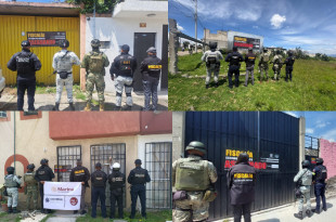 Policías asegurando inmuebles relacionados con despojo en Edoméx