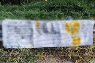 Una manta con amenazas contra comerciantes y habitantes fue reportada en Santa Ana Jilotzingo.