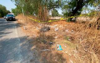 Fuentes policiacas indicaron que unas personas se percataron del bulto sospechoso en el camino viejo a la comunidad de San Marcos