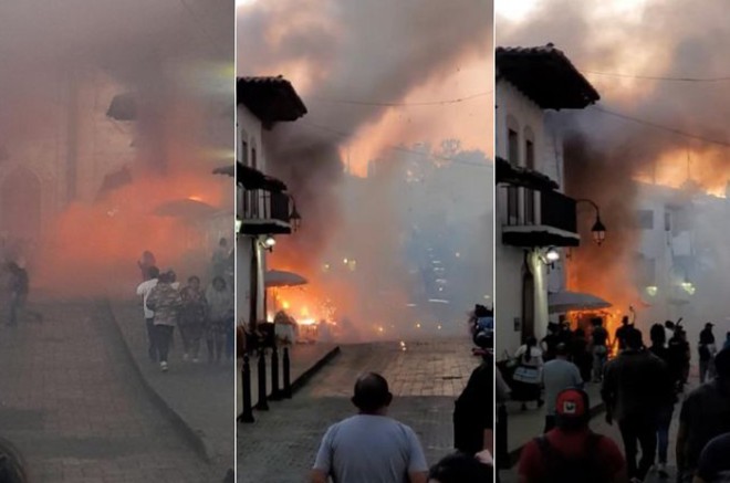 Según los primeros reportes, un cable hizo cortocircuito, lo que provocó la detonación del material pirotécnico y un incendio que rápidamente se extendió por la calle.
