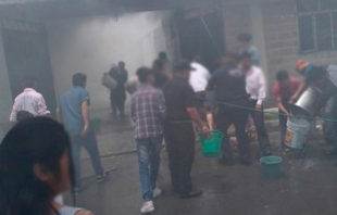 Mueren dos menores tras incendio en Tultepec; los dejaron encerrados