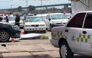 Un muerto deja balacera entre taxistas en sitio de Lerma